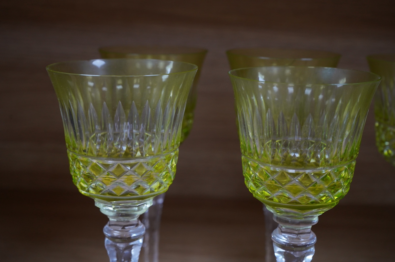 A set of six green cut glass hocks, 20.5cm high. Condition - good